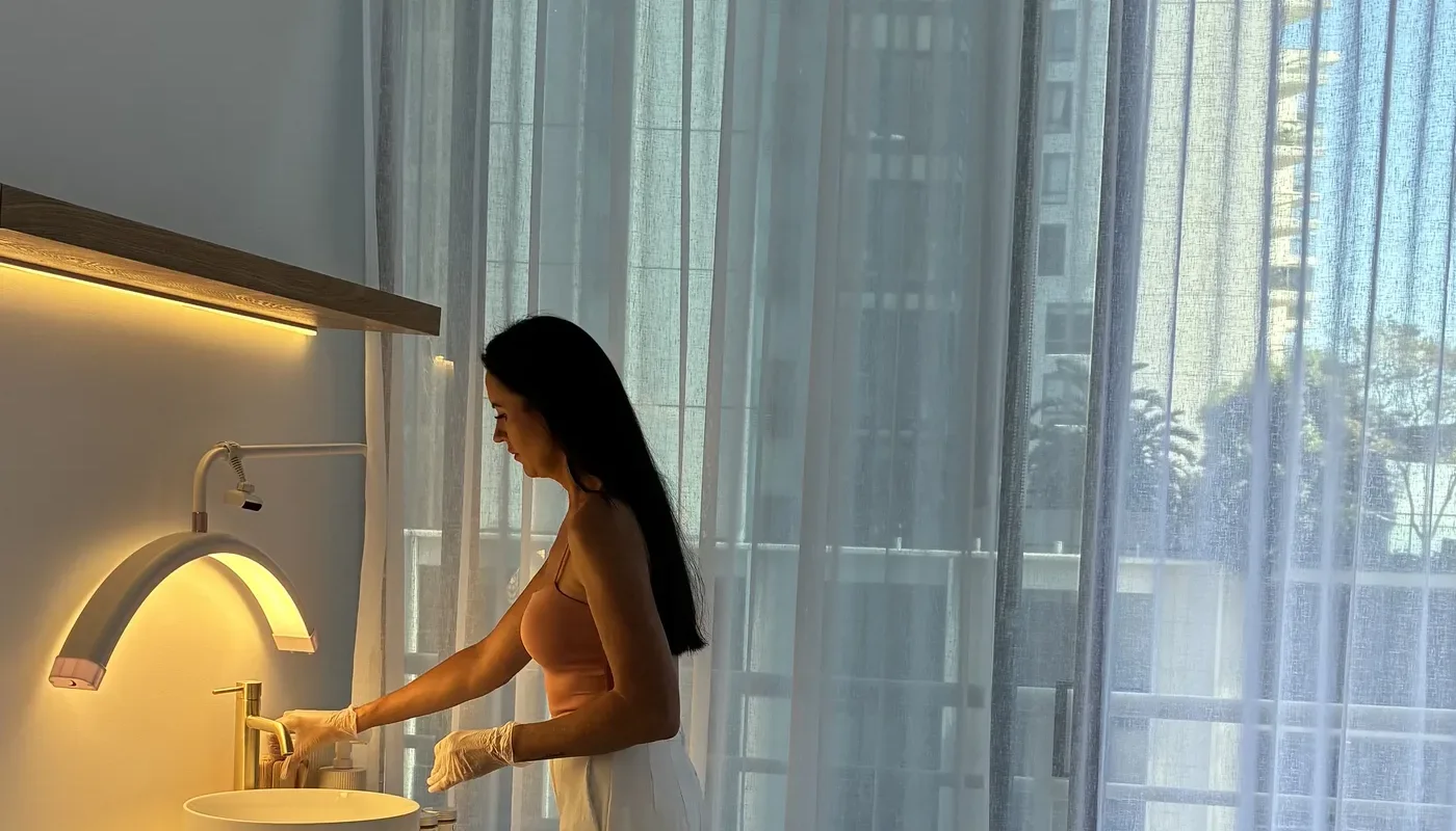 Advanced Rejuvenation treatment room with the practitioner at the basin